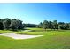 Expansive green golf course with sand trap at 152 Hickory Trace Dr, Goose Creek, SC 29445