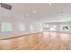 Large interior space with hardwood floors and ample natural light at 278 Meeting St, Charleston, SC 29401