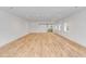 Spacious interior with light oak hardwood floors and white walls at 278 Meeting St, Charleston, SC 29401