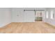Open concept living area with view of the kitchen through sliding barn door at 278 Meeting St, Charleston, SC 29401