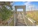 Wooden walkway leading to a dock over the marsh at 359 Clayton Dr, Charleston, SC 29414
