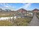 Covered boat lift and dock with marsh views at 359 Clayton Dr, Charleston, SC 29414