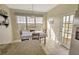 Bright eat-in kitchen with granite countertops, access to a deck, and marsh views at 359 Clayton Dr, Charleston, SC 29414