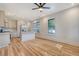 Modern kitchen with lots of natural light, white counters, stainless steel appliances, and a large island at 48 Grove St, Charleston, SC 29403