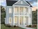 Charming two-story home with a front porch and balcony at 517 Rustling Tree Ct, Summerville, SC 29486
