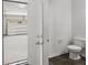 Half bathroom with door open to attached garage at 773 Opal Wing St, Moncks Corner, SC 29461