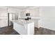 Modern kitchen featuring white cabinetry, granite countertops, and stainless steel appliances at 773 Opal Wing St, Moncks Corner, SC 29461