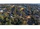 Aerial view of a neighborhood near water, showing houses and golf course at 900 Fairway Dr, Edisto Island, SC 29438