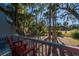 Private deck overlooking a lush, natural landscape at 900 Fairway Dr, Edisto Island, SC 29438