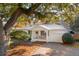 White home with a covered porch, driveway, and landscaped yard at 935 Center St, Mount Pleasant, SC 29464