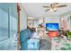 Inviting living room with comfortable seating, a large TV, and views into the kitchen at 107 Dorchester Manor Boulevard, North Charleston, SC 29420