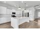 Modern kitchen featuring white cabinetry, an island with sink, and stainless steel appliances at 206 W Respite Ln, Summerville, SC 29483