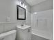 Clean bathroom with white fixtures, a shower/tub combo, and a vanity at 2675 Houston St, North Charleston, SC 29405