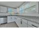 Kitchen with granite countertops, white shaker cabinets, and stainless steel appliances at 2675 Houston St, North Charleston, SC 29405