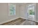 Living room with wood-look flooring and a doorway to another room at 2675 Houston St, North Charleston, SC 29405
