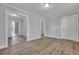 Open living area with wood-look floors and doorways to other rooms at 2675 Houston St, North Charleston, SC 29405