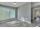 Sunroom with large windows, sliding glass door, and gray walls at 2675 Houston St, North Charleston, SC 29405