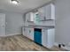 Kitchen with white cabinets, granite countertop, and blue appliances at 2754 Houston St, North Charleston, SC 29405