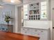 Kitchen with ample storage including large glass front cabinets, wine rack and pantry at 3699 Codorus Ct, Mount Pleasant, SC 29466