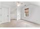 Cozy carpeted bedroom with ceiling fan and closet at 42 Isle Of Hope Rd, Mount Pleasant, SC 29464