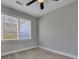 Empty bedroom with gray walls, wood-look floors, and two windows at 442 Annette Dr, Goose Creek, SC 29445