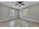 Spacious bedroom with gray walls, wood-look floors, and ample natural light at 442 Annette Dr, Goose Creek, SC 29445