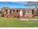 Charming brick home with a lush green lawn and updated windows at 442 Annette Dr, Goose Creek, SC 29445