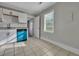 Kitchen with white cabinetry, tile floors, and blue appliances at 442 Annette Dr, Goose Creek, SC 29445