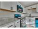 Modern kitchen with sleek white cabinets and light granite countertops at 442 Annette Dr, Goose Creek, SC 29445