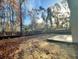Spacious, partially fenced backyard with a concrete patio at 518 Fleming Rd, Charleston, SC 29412