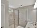 Modern bathroom with marble-tiled shower, dual vanity, and sleek fixtures at 518 Fleming Rd, Charleston, SC 29412