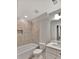 Modern bathroom with tiled shower, white vanity, and neutral-toned tile flooring at 518 Fleming Rd, Charleston, SC 29412