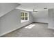 Spacious bedroom with vaulted ceiling, window, and plush gray carpet at 518 Fleming Rd, Charleston, SC 29412