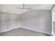 Empty bedroom with gray carpet, white trim, and vaulted ceiling at 518 Fleming Rd, Charleston, SC 29412