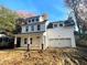 Charming two-story home with white siding, brick accents, and attached garage at 518 Fleming Rd, Charleston, SC 29412