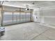 Unfinished garage with open door, concrete floor, and exposed framing at 518 Fleming Rd, Charleston, SC 29412