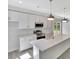 White kitchen featuring an island with quartz countertops and stainless steel appliances at 518 Fleming Rd, Charleston, SC 29412