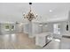 Open floor plan showcasing kitchen island, dining, and living areas at 518 Fleming Rd, Charleston, SC 29412