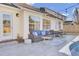 Relaxing patio area with outdoor furniture, string lights, and a glimpse of the pool at 587 Tribeca Ct, Charleston, SC 29414