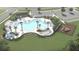 Community pool with a playground, cabana and lounge chairs at 610 Red Monarch Way, Moncks Corner, SC 29461