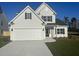 Two-story house with white siding, gray roof, and a two-car garage at 144 Seaton Street, Summerville, SC 29486