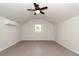 Bright bedroom with wood floors, ceiling fan, and window air conditioning unit at 1808 Calvert St, North Charleston, SC 29405