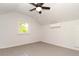 Bedroom featuring wood floors, a ceiling fan, window air conditioning, and ample natural light at 1808 Calvert St, North Charleston, SC 29405