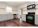 Bright, modern kitchen with stainless steel appliances, gray cabinets, and wood countertops at 1808 Calvert St, North Charleston, SC 29405