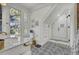 Elegant bathroom with marble vanity, walk-in shower, and geometric tile floor at 208 Sumter Ave, Summerville, SC 29483