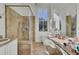 Spa-like bathroom with walk-in shower, vanity, and large window at 208 Sumter Ave, Summerville, SC 29483