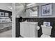 Elegant bathroom with dark tile, white vanity, and marble countertop at 208 Sumter Ave, Summerville, SC 29483
