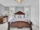 Main bedroom with king-size bed and built-in closets at 208 Sumter Ave, Summerville, SC 29483