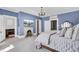 Bedroom with fireplace and access to another room at 208 Sumter Ave, Summerville, SC 29483