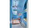Bright blue bedroom with built-in bunks, colorful rug, and ample storage at 208 Sumter Ave, Summerville, SC 29483